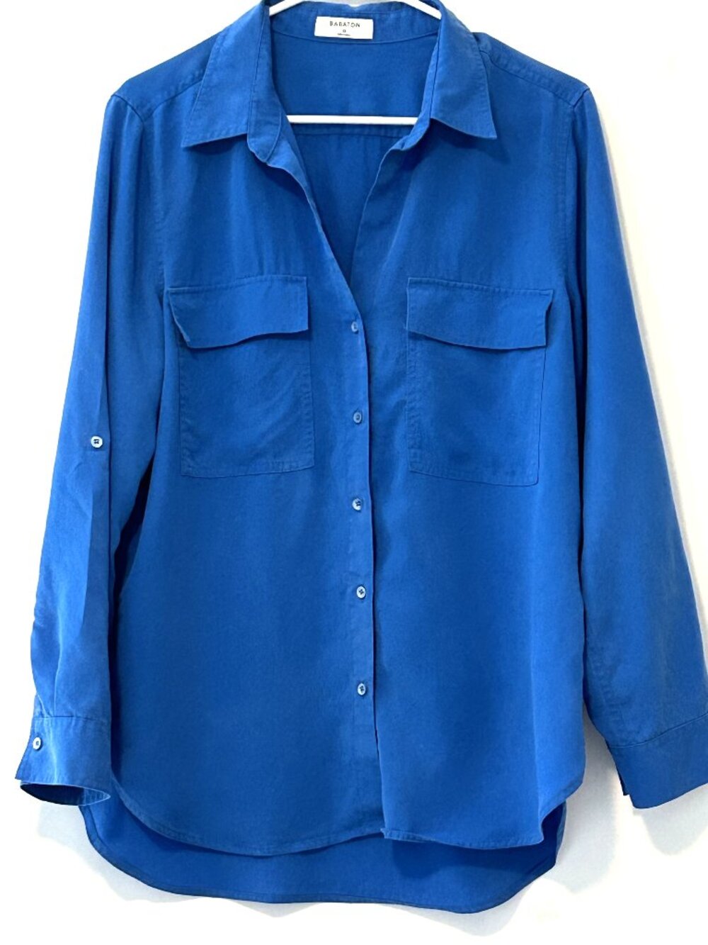 Babaton blue long sleeve button down top, size medium